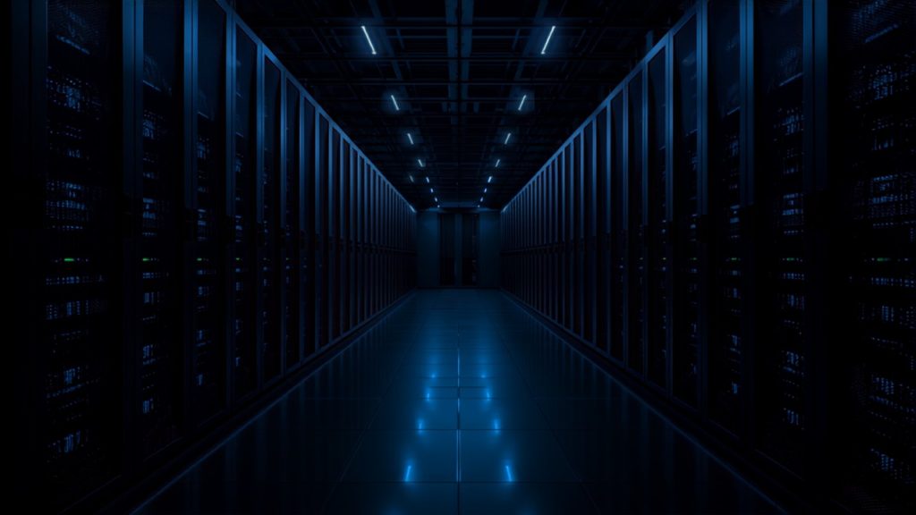 Server racks in a data center, the web hosting layer that website maintenance does not cover.